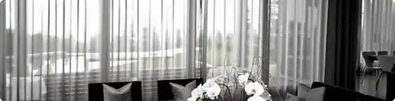 Floor-to-ceiling sheer curtains