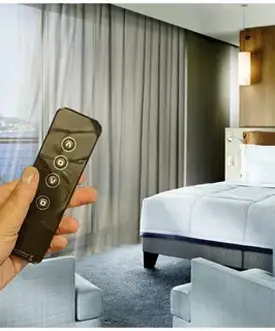 Automated curtain remote Dubai bedroom