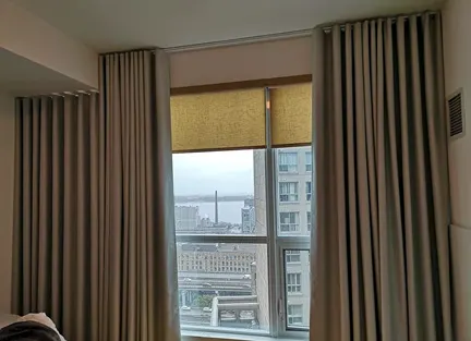 Brown wave curtains with roller blinds Dubai