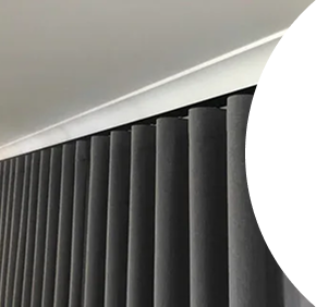 Elegant beige wave curtains with decorative rod Dubai